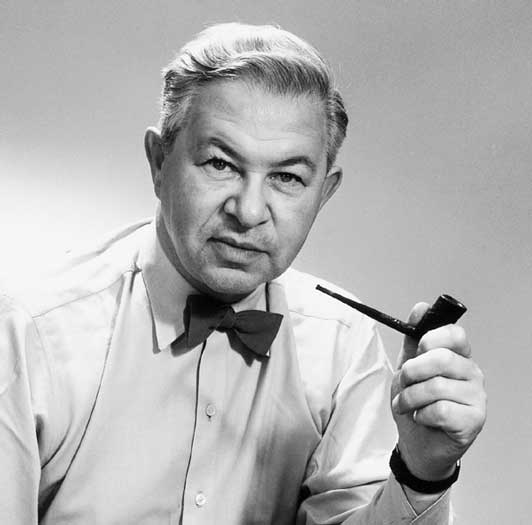 A picture of Arne Jacobsen smoking a pipe